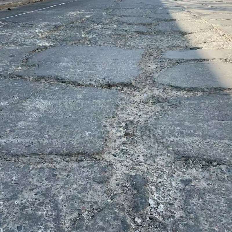吴兴路面起砂露石子修补料